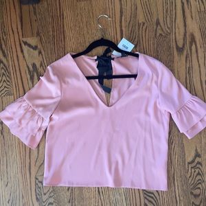 Pink blouse from topshop (size two) - new with tags